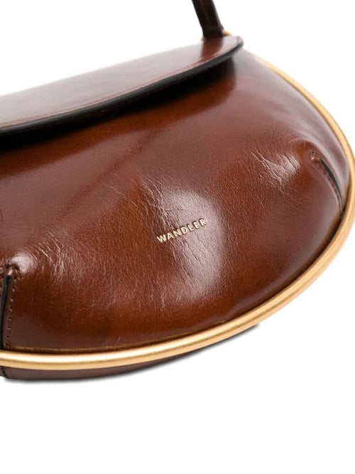 Borsa in pelle marrone con tracolla e motivo decorativo in oro