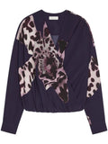Blusa con scollo profondo